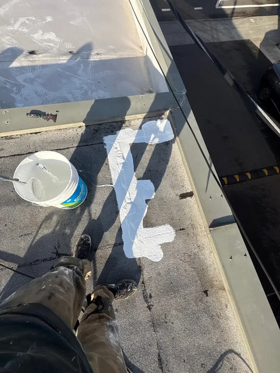 Commercial flat roof detail being evaluated for repair
